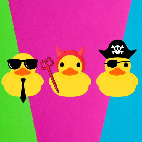 Three yellow rubber ducks on a colorful background dressed as a secret service agent, a devil and a pirate