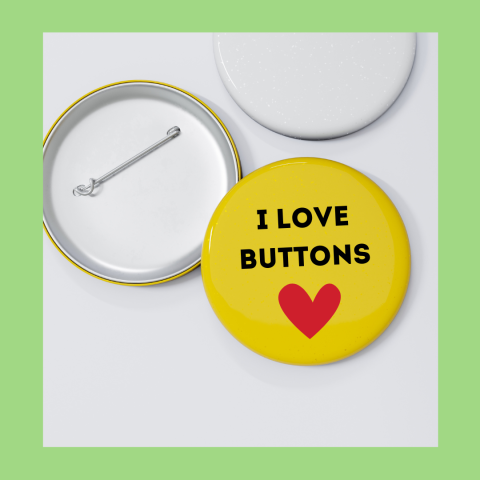 Yellow button with red heart and text that reads "I love buttons" with a light green border.