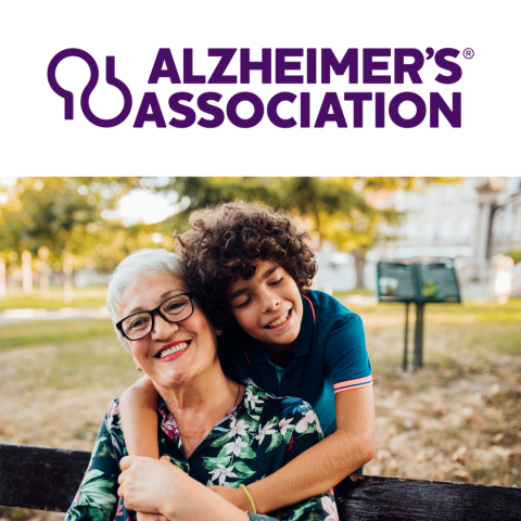 An older women is held lovingly by a younger relative, the logo for "Alzheimer's Association" in purple text is above them.