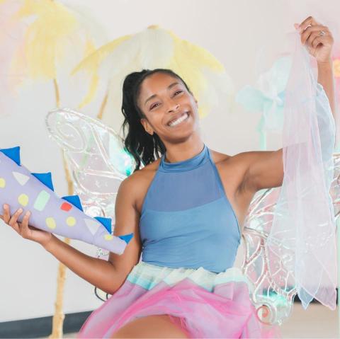 woman sitting with scarves around her