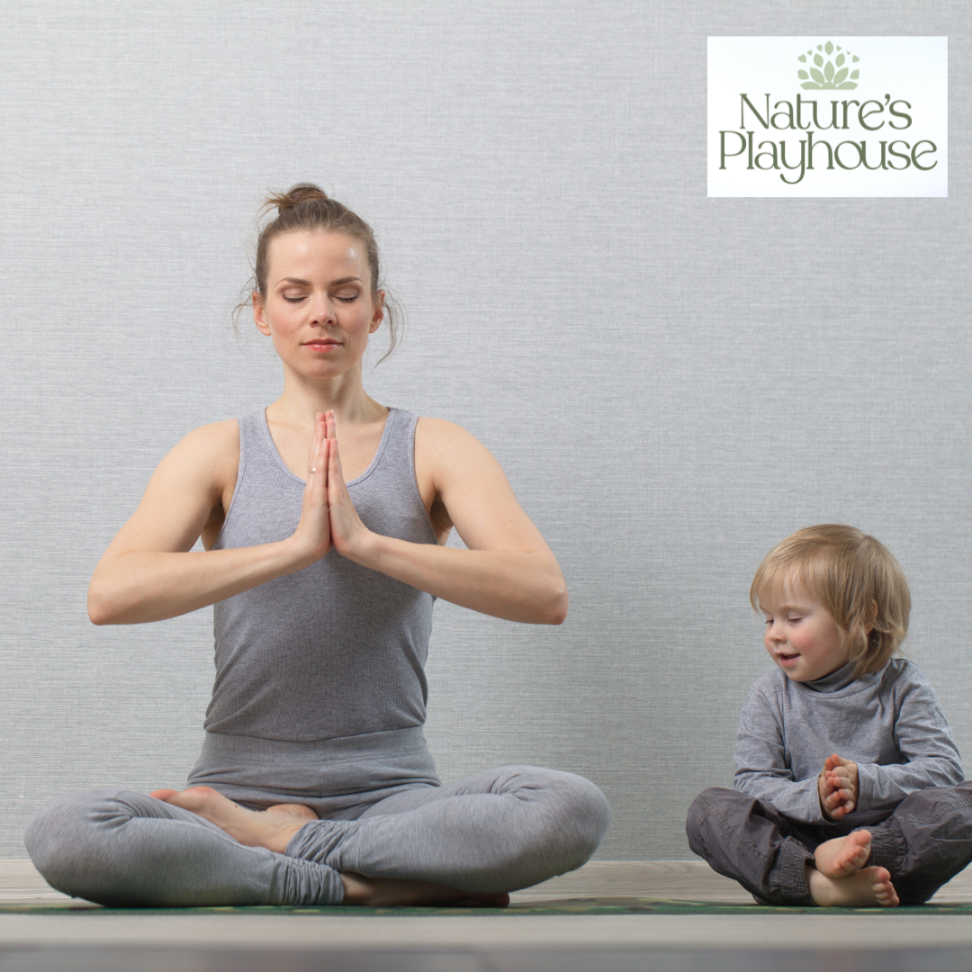 Woman and toddler in yoga pose.