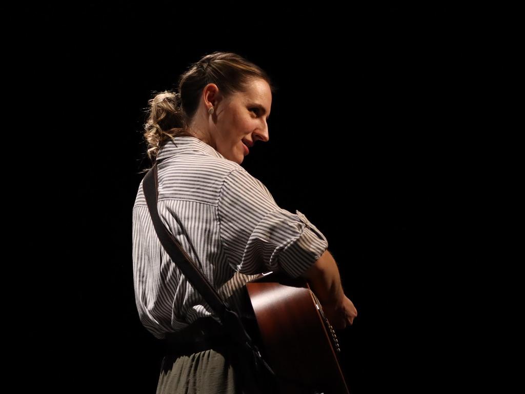 Anna Marck playing the guitar