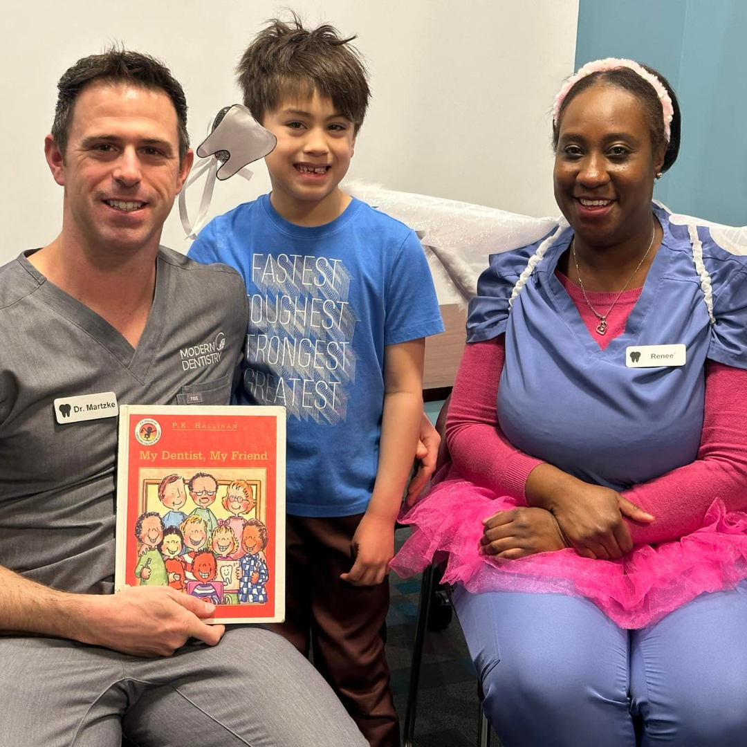 Dr. Nathan Martzke, a child and Renee, the tooth fairy. 