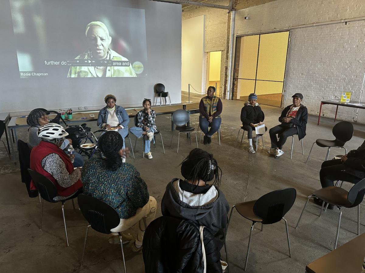 members of an oral history workshop learning together in a circle